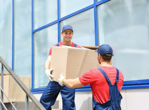 House movers loading furniture for a home move in Hampton Wick