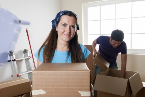 Furniture and boxes being loaded into a moving van