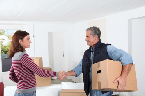 Packed boxes and furniture ready for local house removals in Hampton Wick